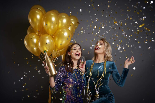 Friends having a fun while new year’s eve Свята в Польщі - Orzeł Biały